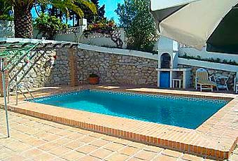 Swimming pool & Barbecue terrace at Villa in Calahonda